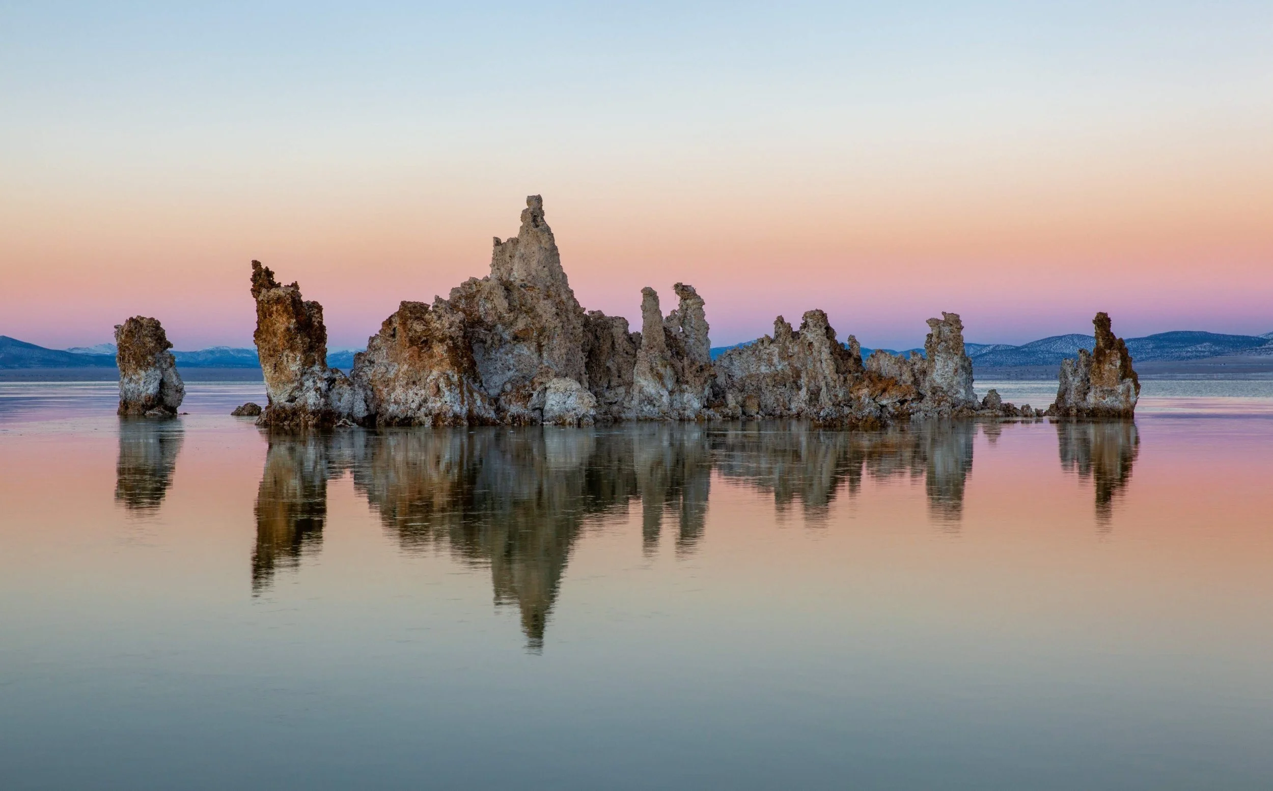 Mono Lake tufa towers reflected at dusk, California
